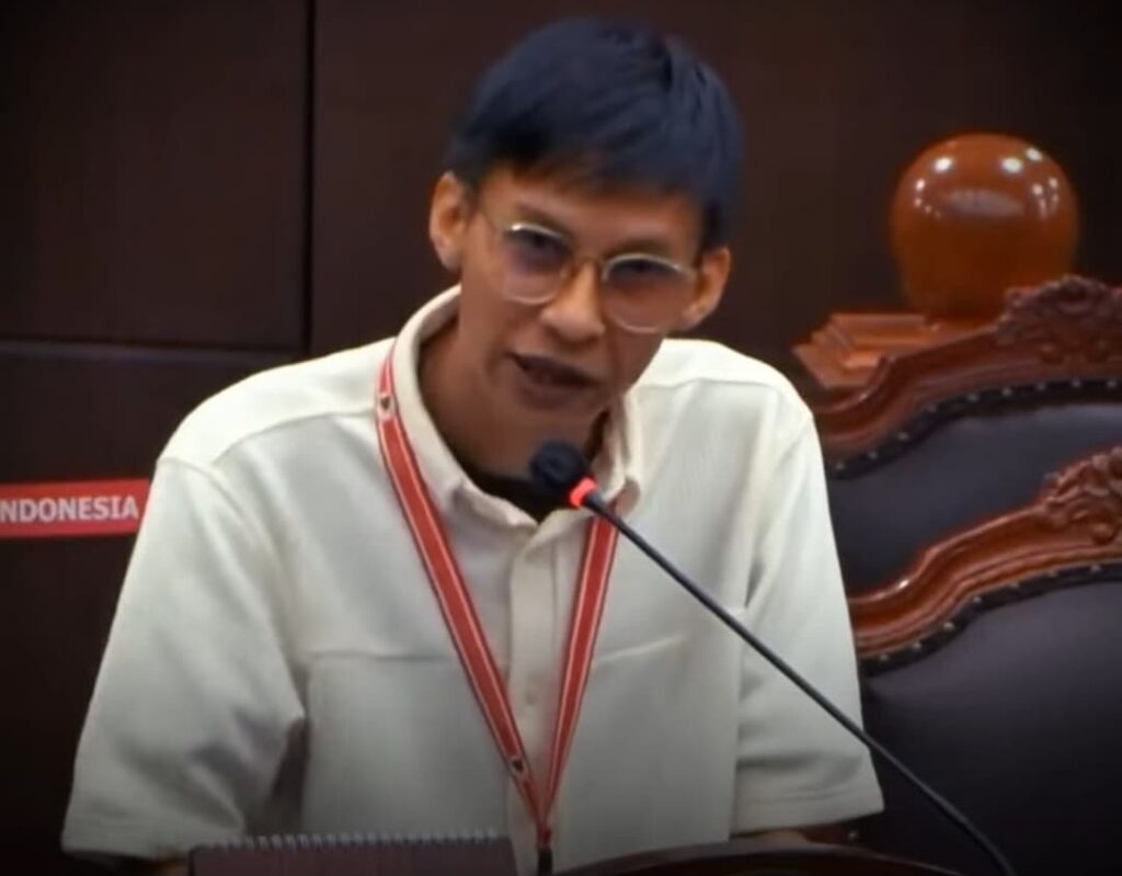 Tri Stiawan di Sidang pengujian materiil UU Nomor 12 Tahun 1980 di Mahkamah Konstitusi (MK), Selasa (20/1/2026), (screenshot video akun FB @AMK/istimewa)