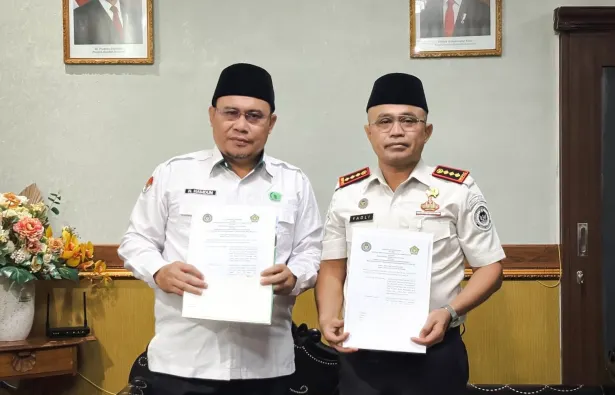 Penandatanganan PKS antara Kalapas Lombok Barat dan Kepala Kemenag Mataram terkait pembinaan rohani (GETNEWS.)